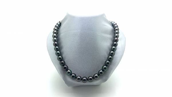 46 dark colored Tahitian pearls on steel cable.